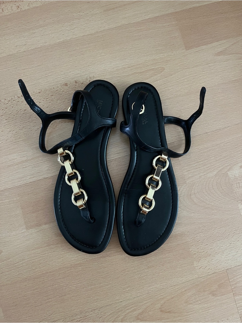 Michael Kors Black Women’s Chain-Accent T-Strap Sandals